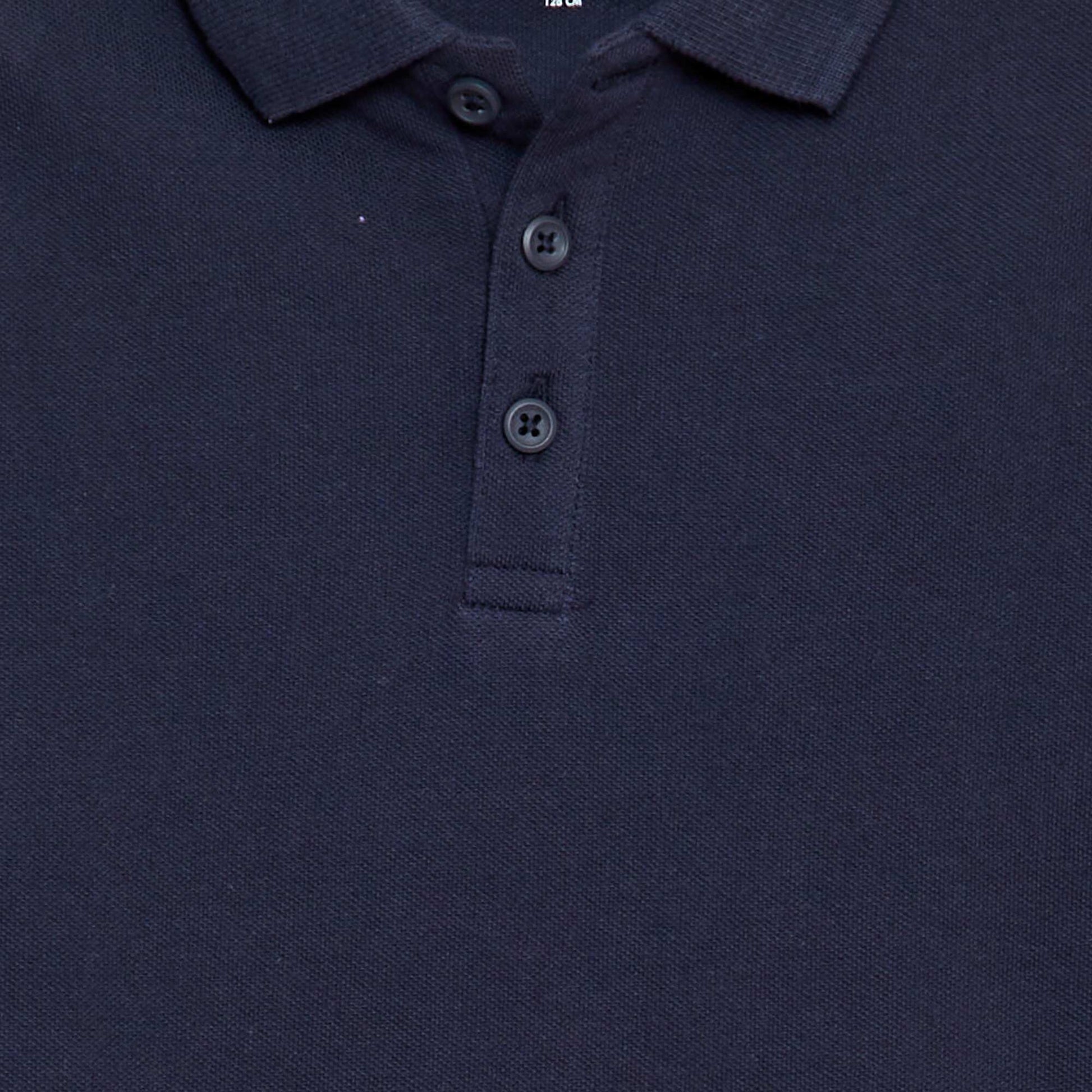 Polo uni en maille piquée MARINE