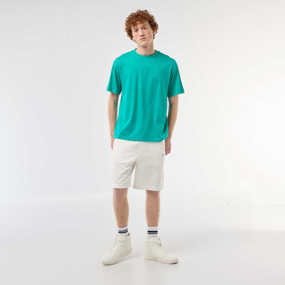 Short uni en french terry coton avec poches zippées BLANC