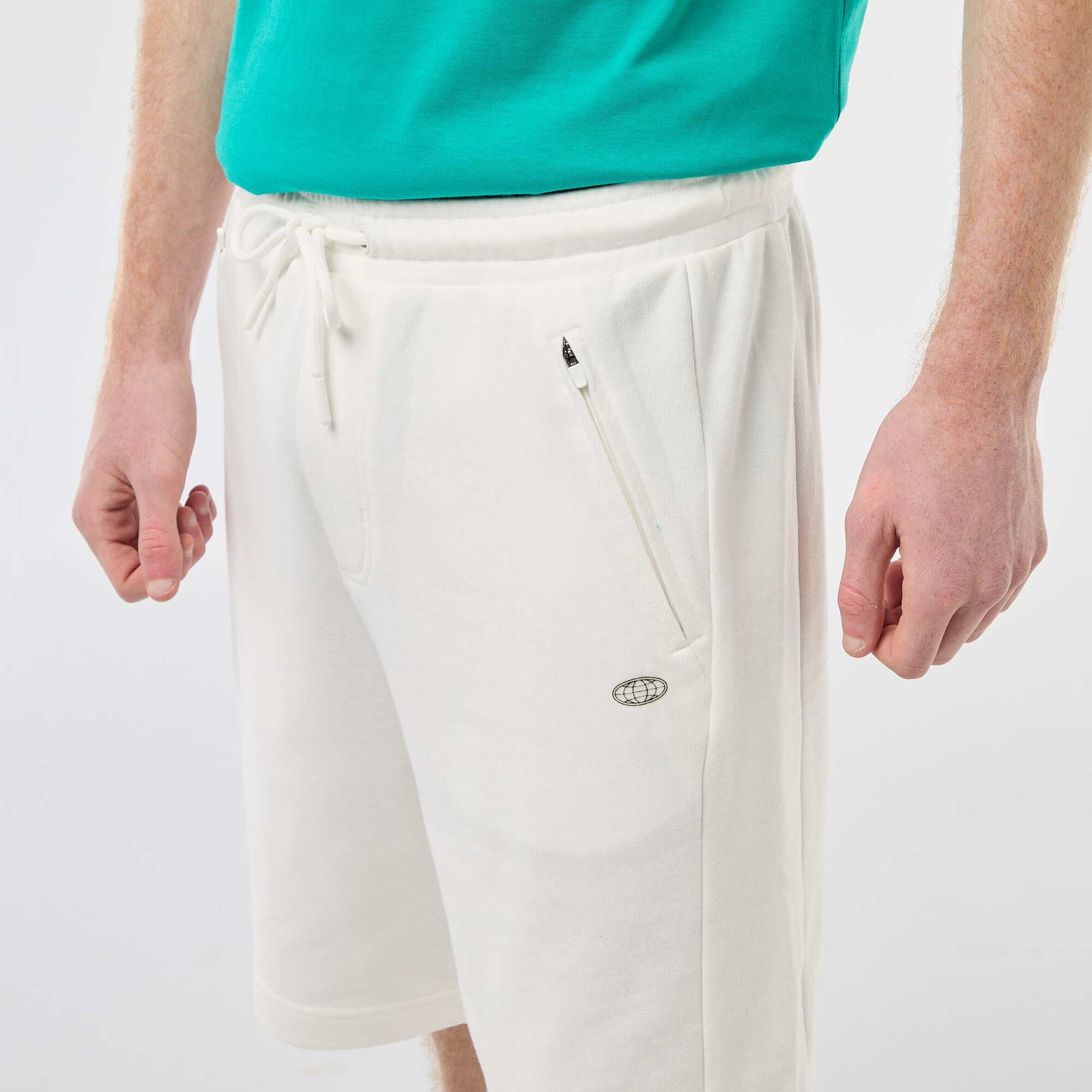 Short uni en french terry coton avec poches zippées BLANC