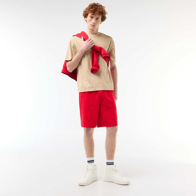 Short uni en french terry coton avec poches zippées ROUGE