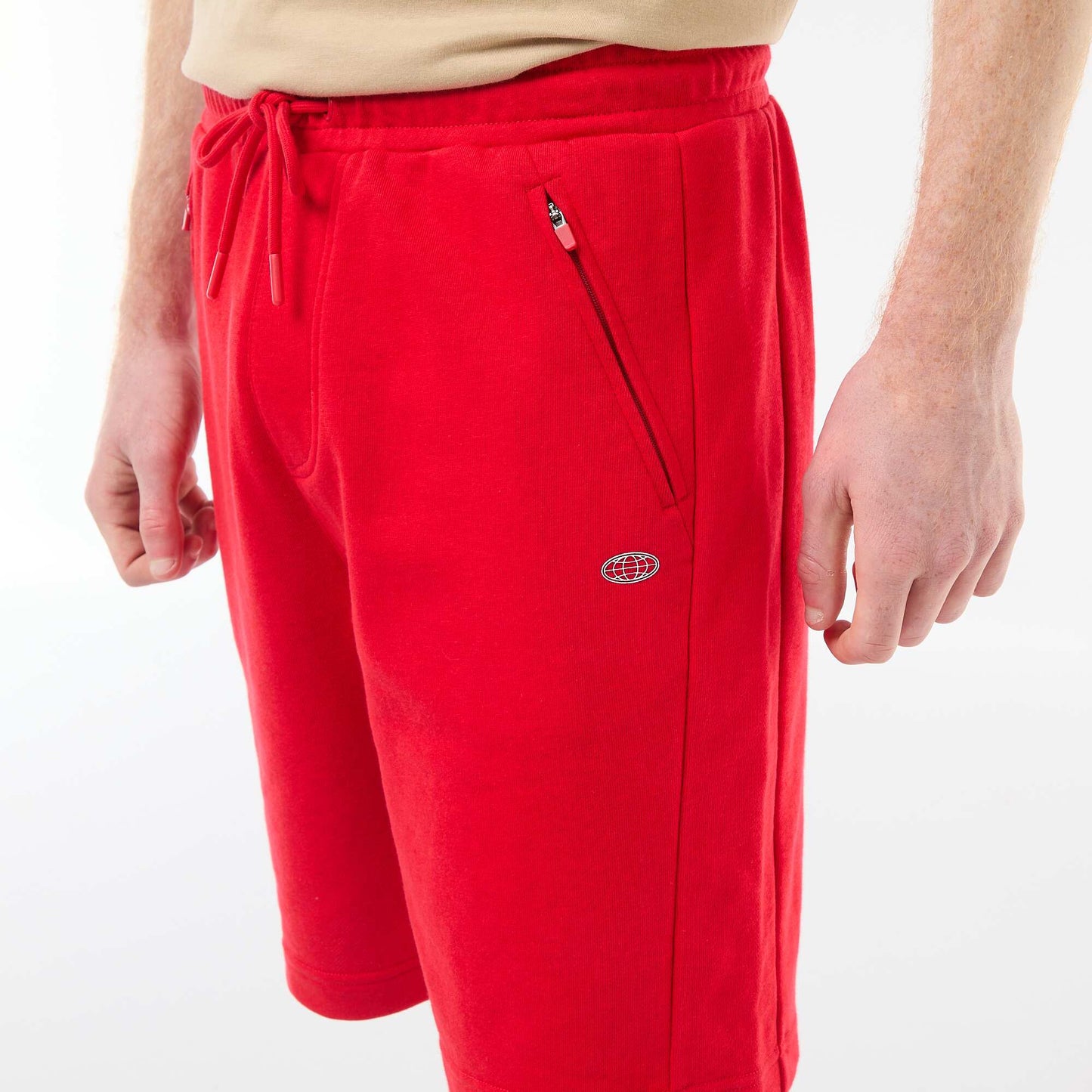 Short uni en french terry coton avec poches zippées ROUGE