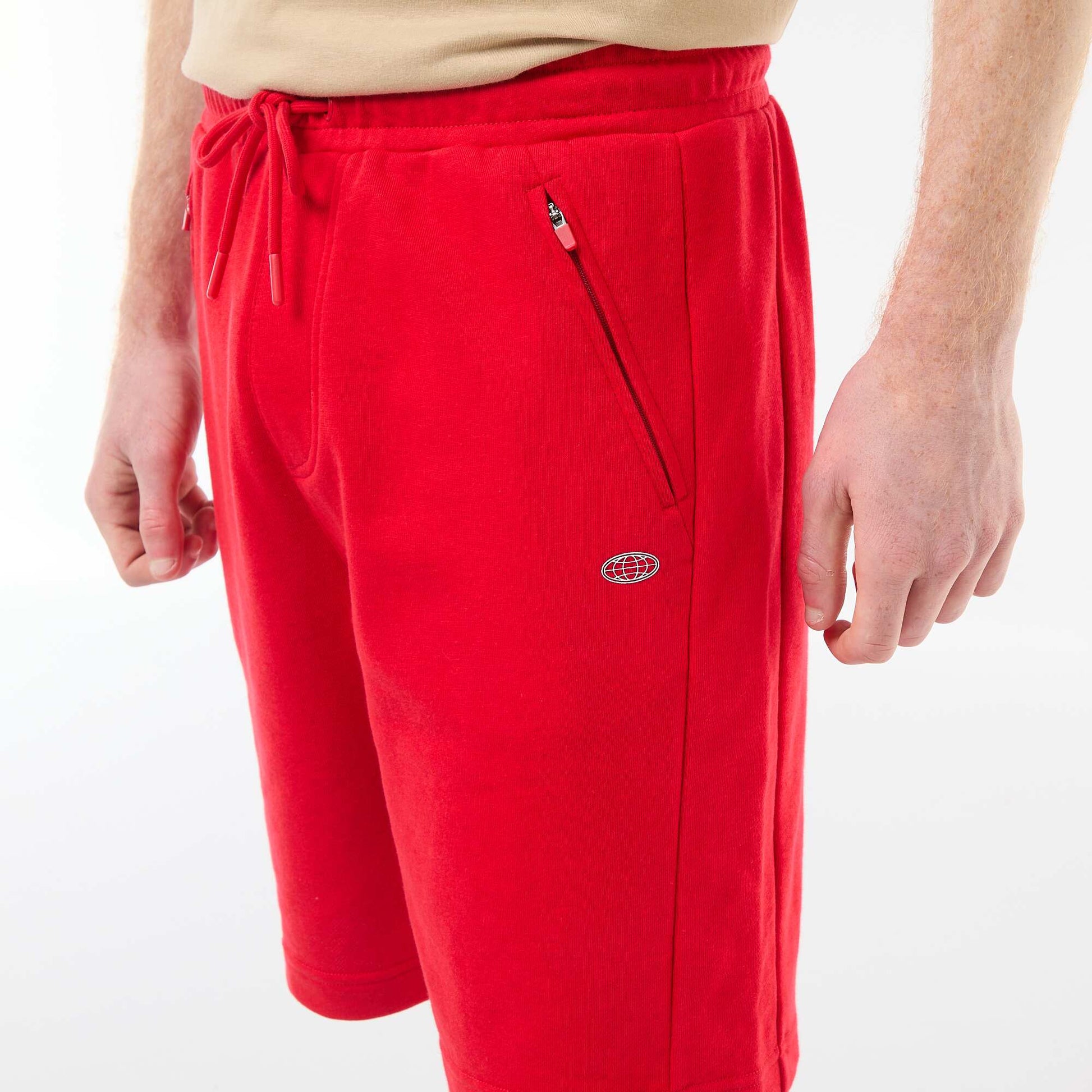 Short uni en french terry coton avec poches zippées ROUGE